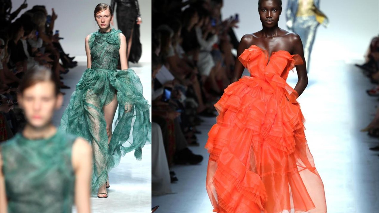Dos modelos desfilan creaciones del diseñador Ermanno Scervino en Milán.