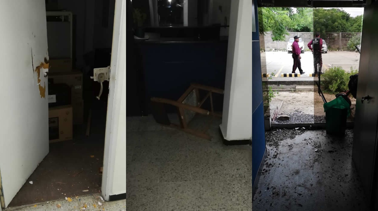 Oficina de Planeación y la entrada a rectoría, al fondo unos vigilantes.