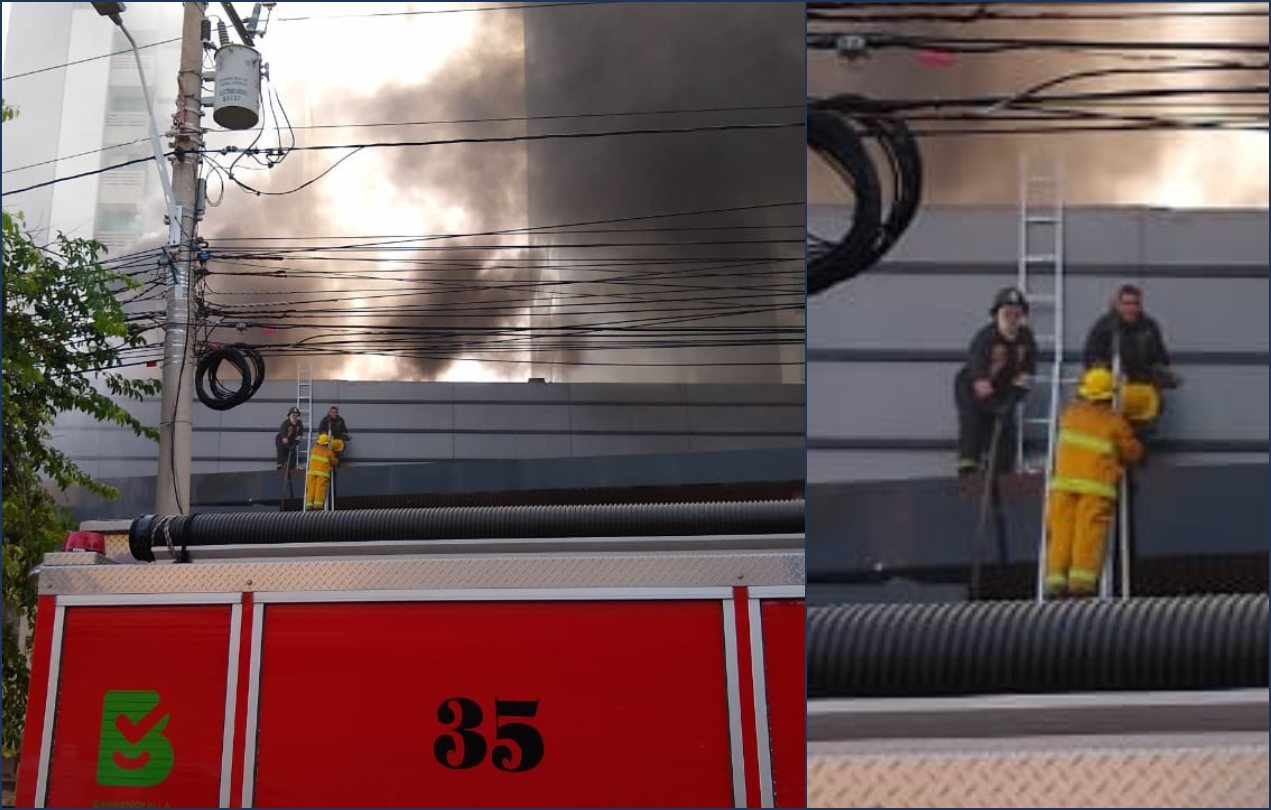 Bomberos trabajan para sofocar el incendio.