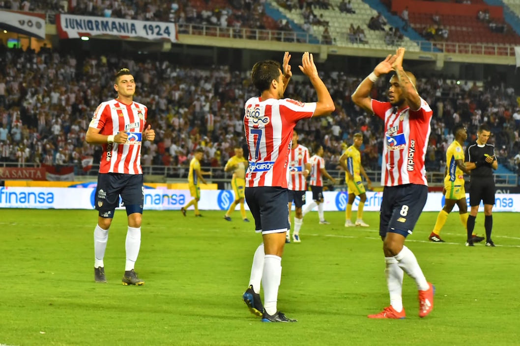 Celebración juniorista del tercer gol.