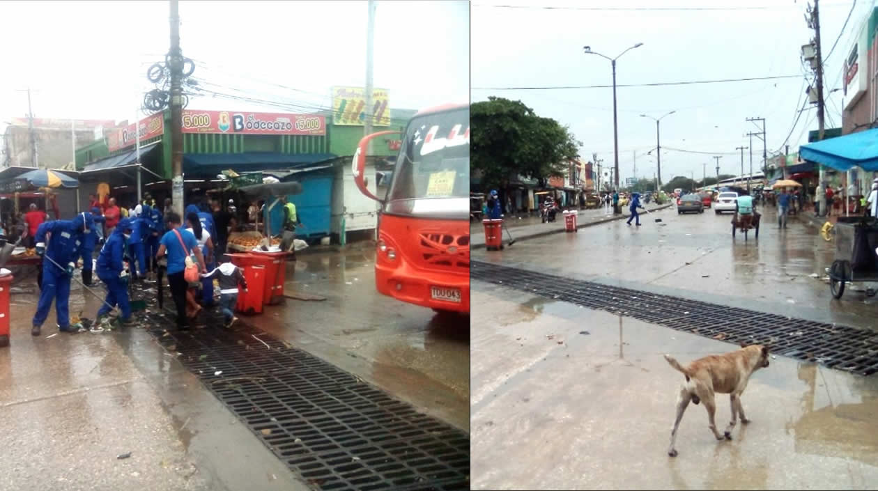 Escobitas de la Triple A retirando basuras en las rejillas de la calle 30 con carrera 41.