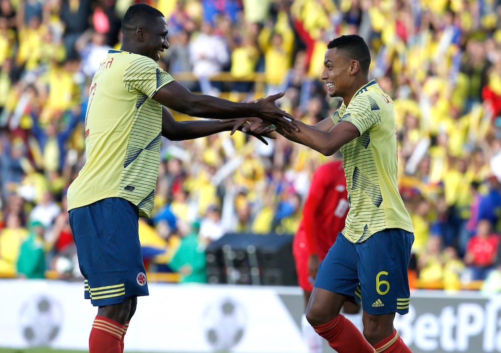 William Tesillo y Cristian Zapata celebrando la apertura del marcador.