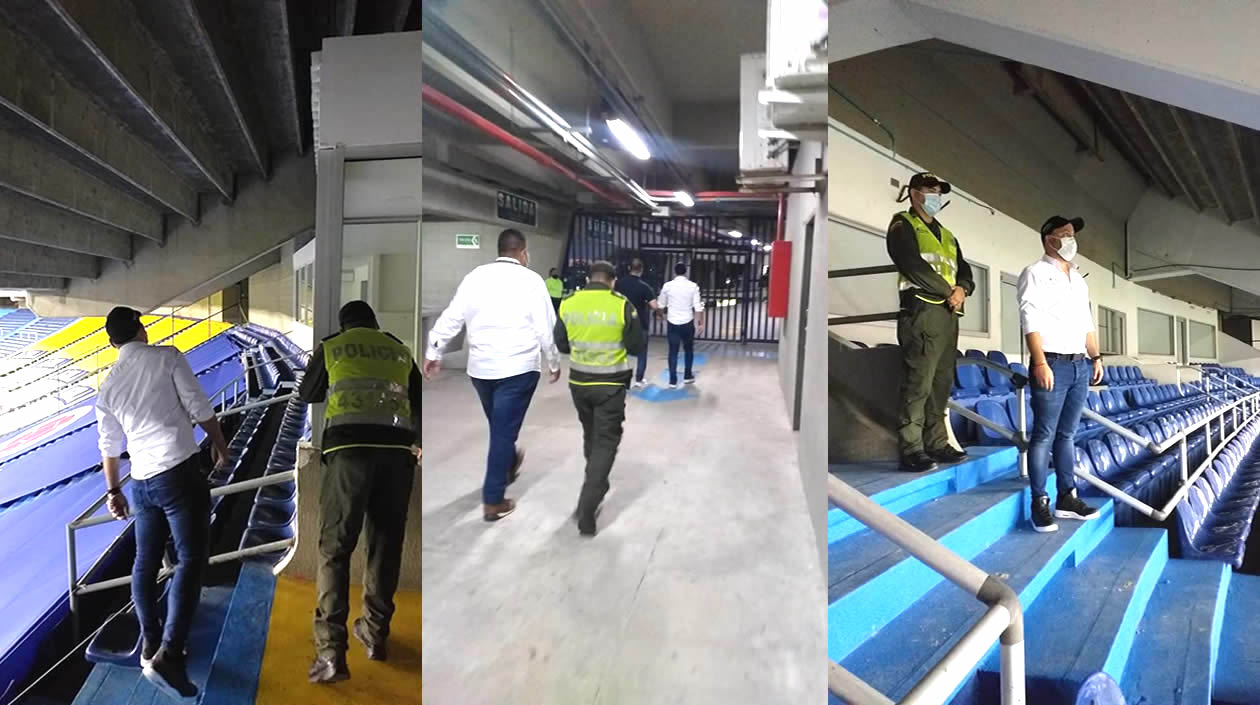 El Jefe de la Oficina de Seguridad, Nelson Patrón, y la Policía Nacional verificando el retiro de los 'colados'.