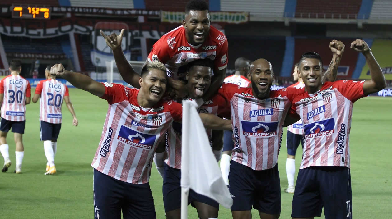 Celebración juniorista del gol del triunfo.