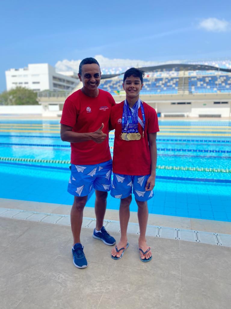 Fredy Díaz, entrnador, y Thomas Alsina, deportista.