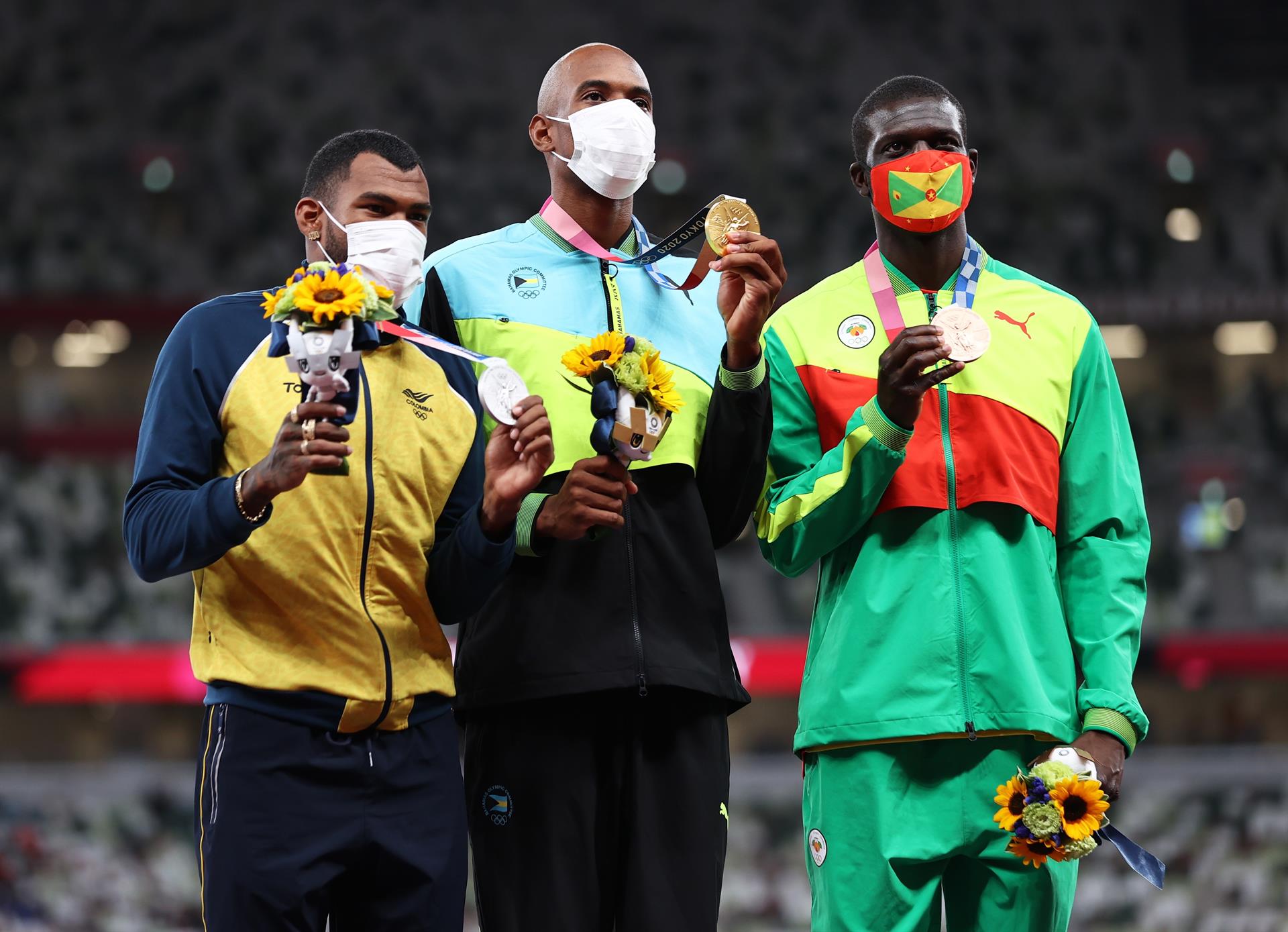 Zambrano, Gardiner y James, los medallistas olímpicos. 