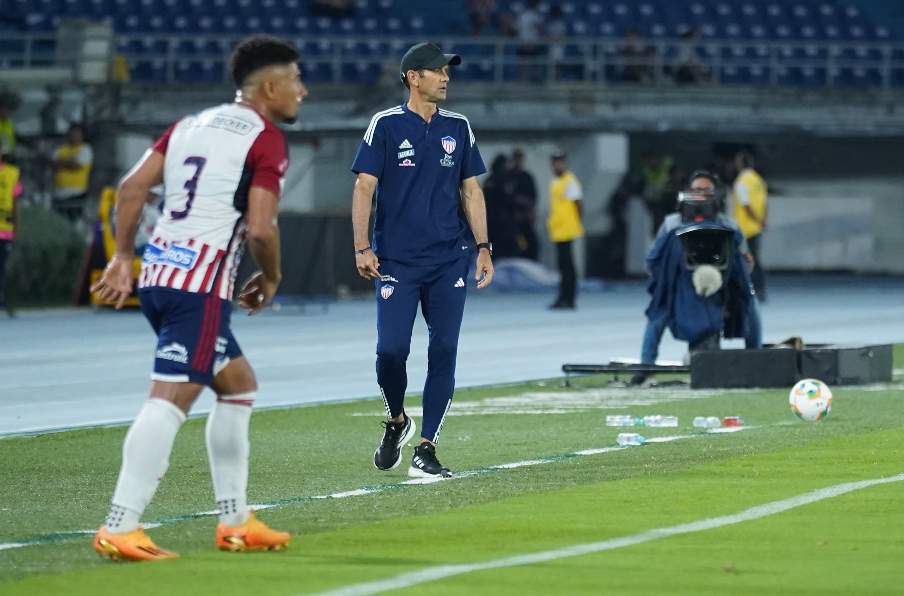 Edwin Herrera y el técnico Arturo Reyes.