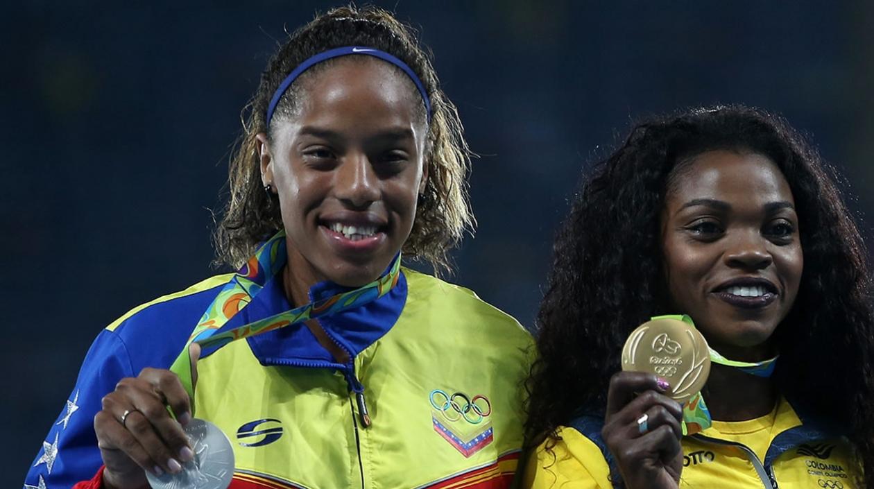  La atleta colombiana Caterine Ibarguen (d) junto a la venezolana Yulimar Rojas (i