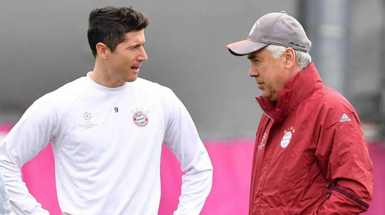 Robert Lewandowski  y Carlo Ancelotti.
