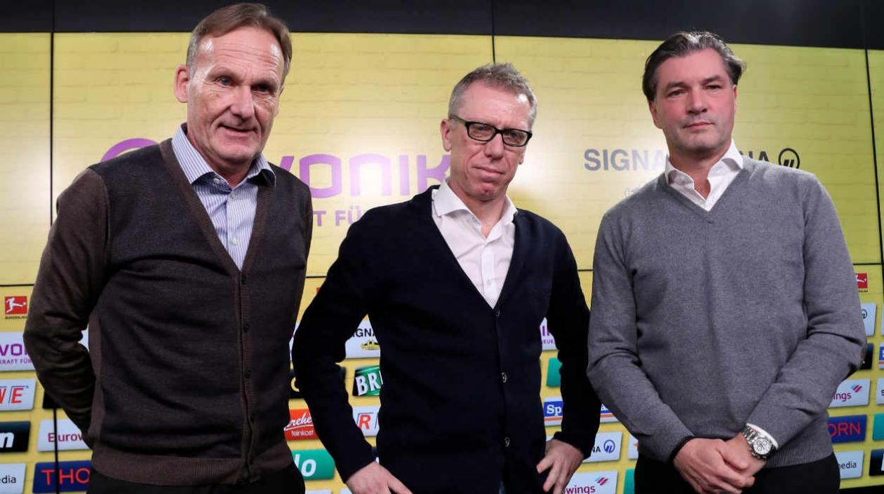 Hans-Joachim Watzke, Peter Stoeger y Michael Zorc.