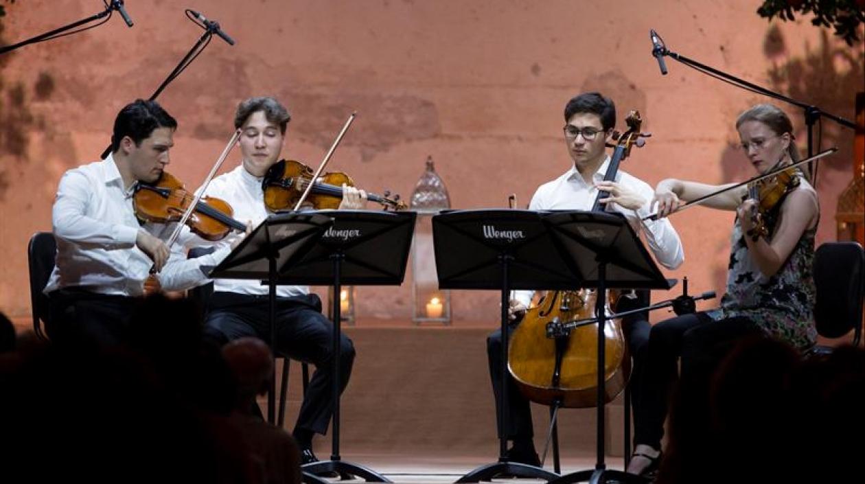 Erik Schumann (violín), Ken Schumann (violín), Mark Schumann (violonchelo) y Liisa Randalau (viola), integrantes del Cuarteto Schumann de Alemania.