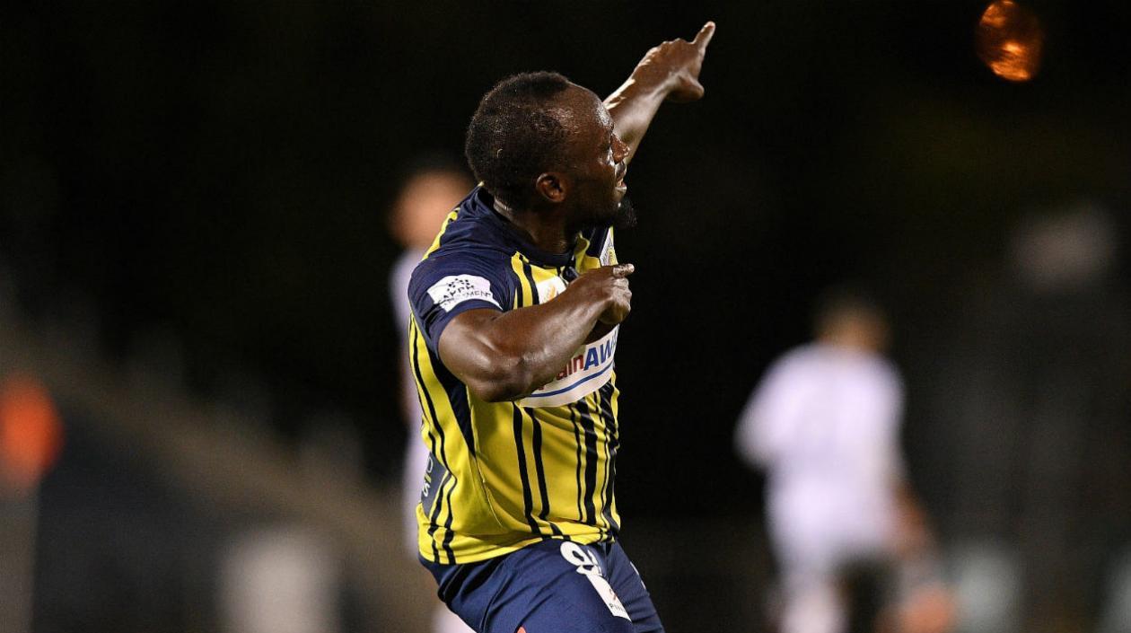 Usain Bolt celebró en su particular estilo. 