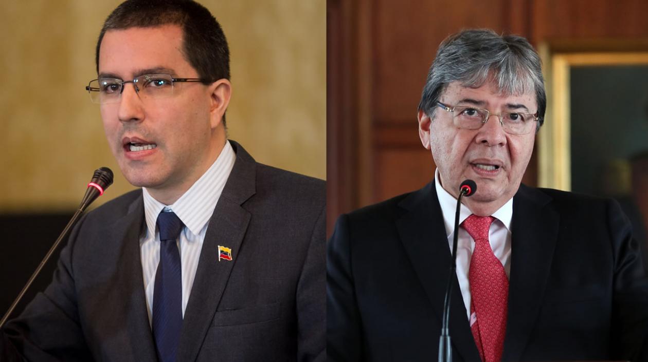 Jorge Arreaza. y Carlos Holmes Trujillo