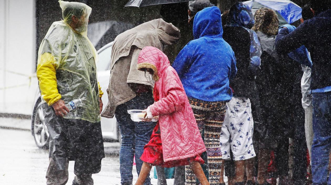 Trescientos inmigrantes de caravanas estancados en Tijuana piden ayuda para regresar