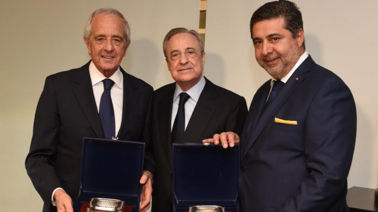 Rodolfo D'Onofrio, Florentino Pérez y Daniel Angelici.