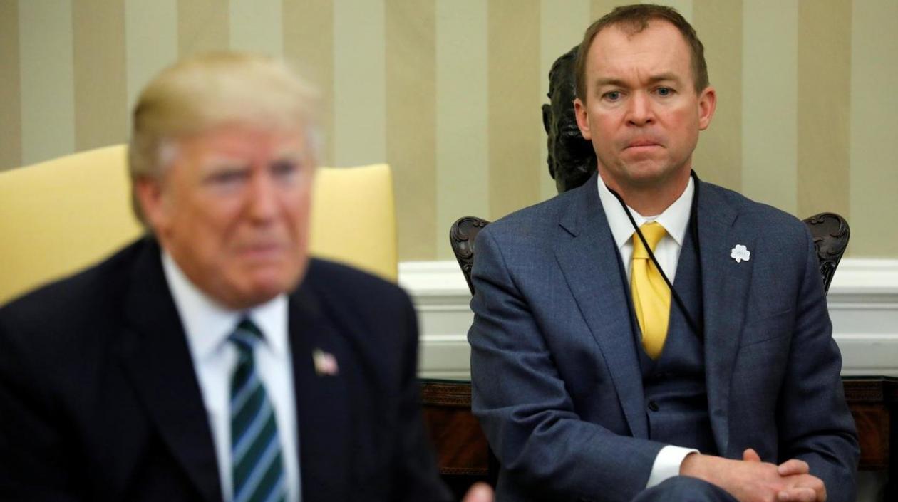 Donald Trump, presidente de Estados Unidos y su nuevo jefe de gabinete Mick Mulvaney.
