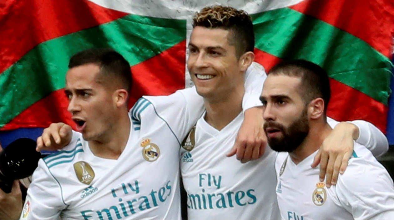 Lucas Vásquez celebra con Cristiano Ronaldo y Daniel Carvajal. 