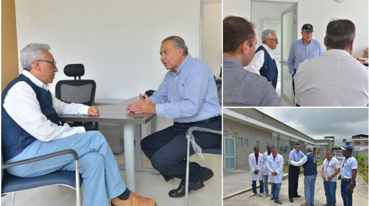 El director de Medicina Legal, Carlos Valdés y el Vicepresidente Óscar Naranjo.