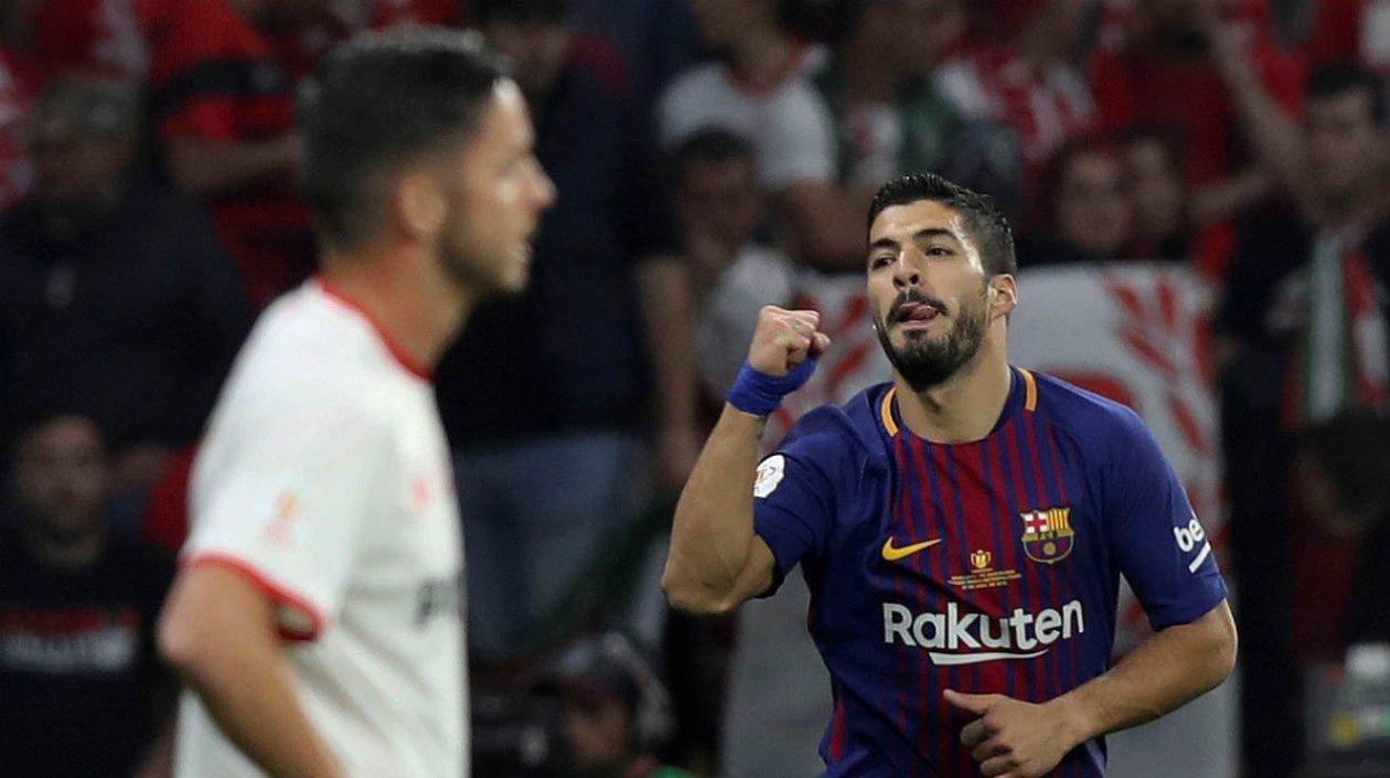 Luis Suárez anotó dos goles en el triunfo. 