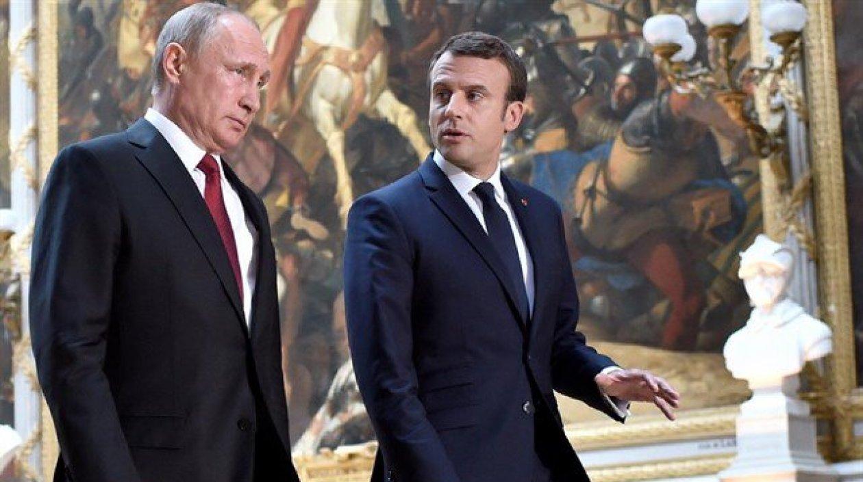 El presidente ruso Vladimir Putin junto a su homólogo francés, Emmanuel Macron.