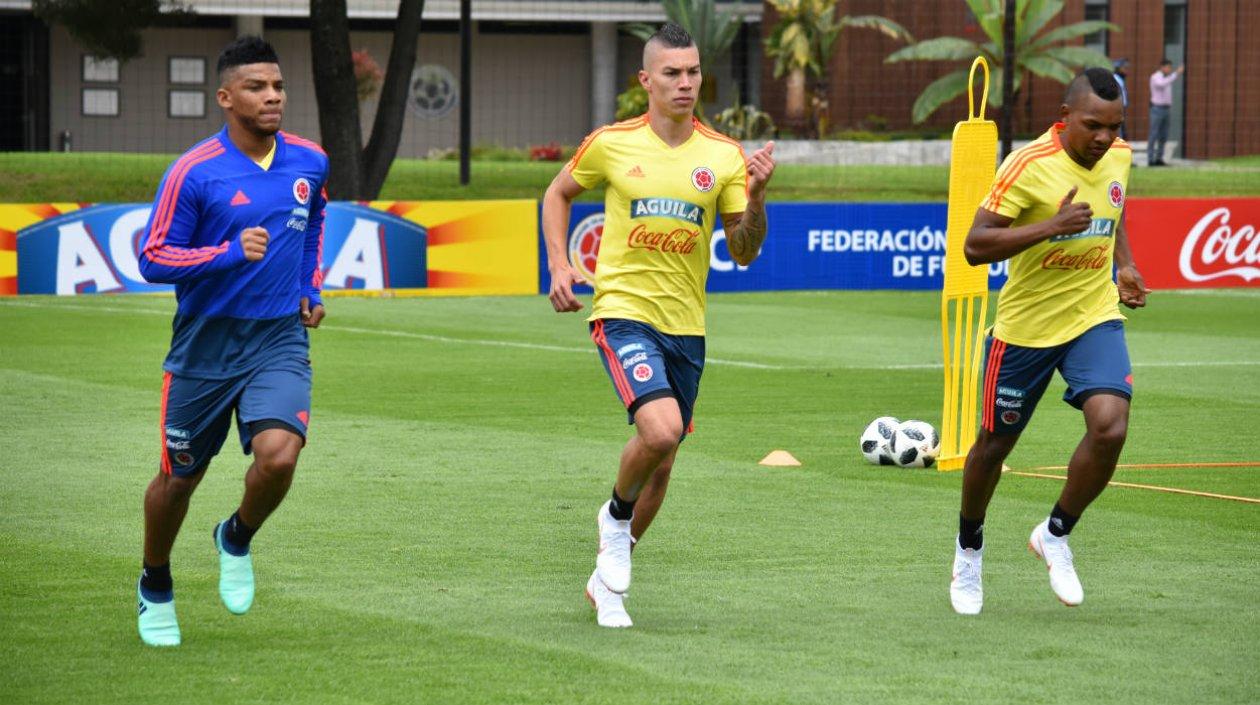 Frank Fabra, Matheus Uribe y José Izquierdo durante los entrenamientos. 
