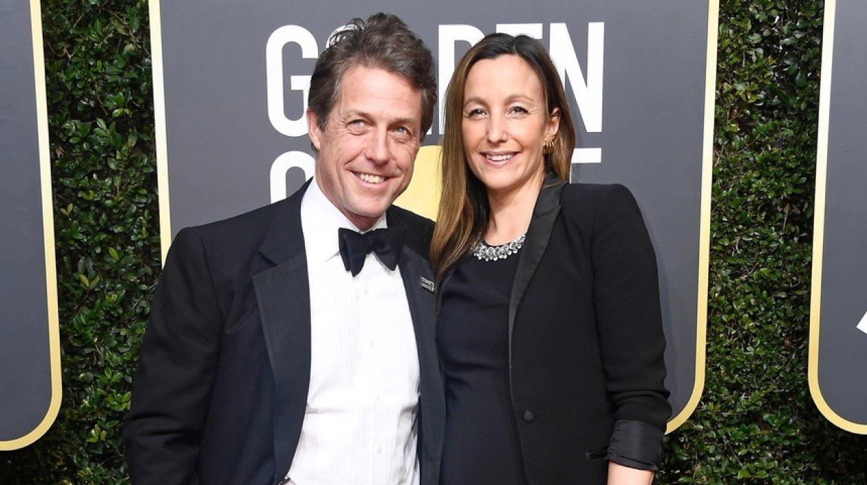 El actor Hugh Grant y su novia Anna Eberstein.