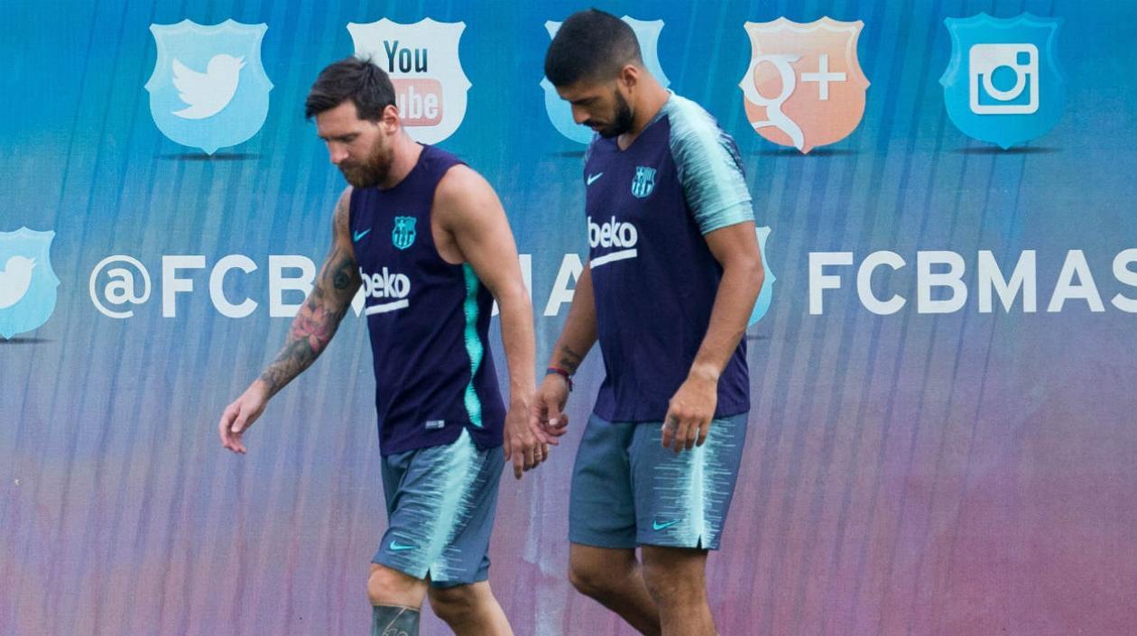 Lionel Messi y Luis Suárez. 
