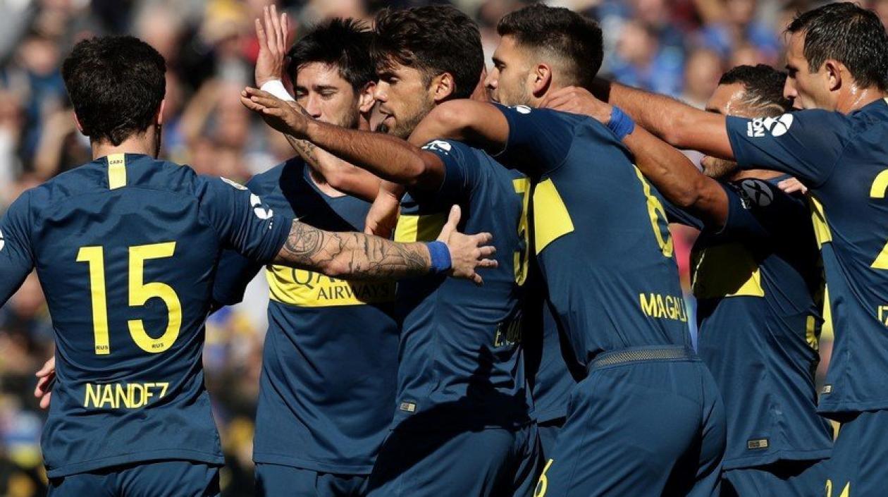 Jugadores de Boca celebran el triunfo. 