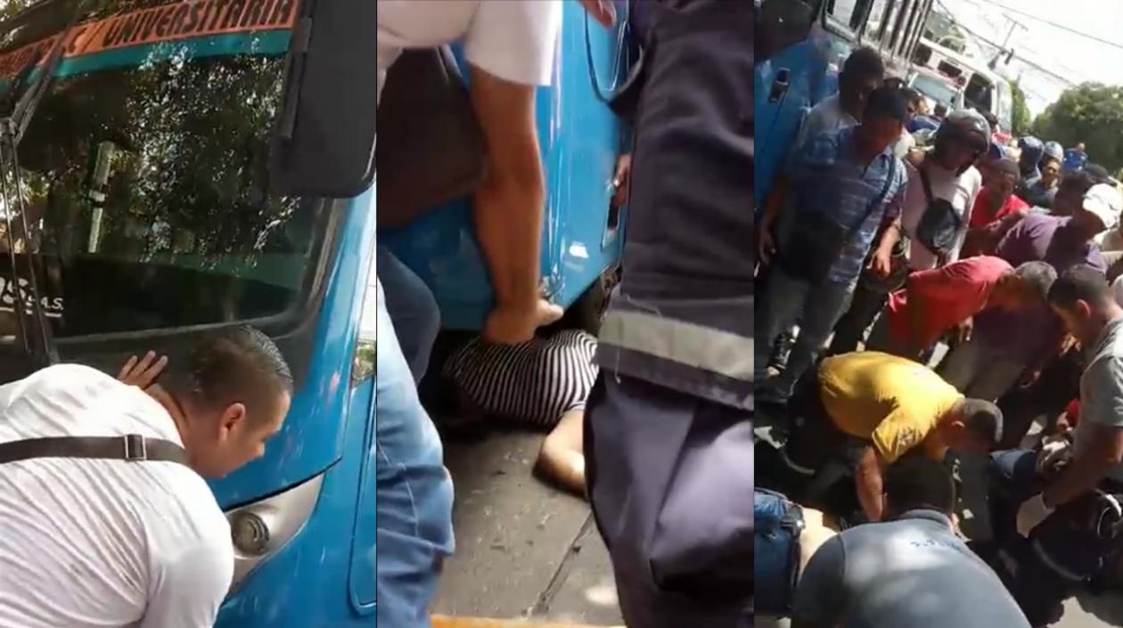 Momentos en que la mujer era auxiliada para ser sacada debajo de las llantas del bus. 