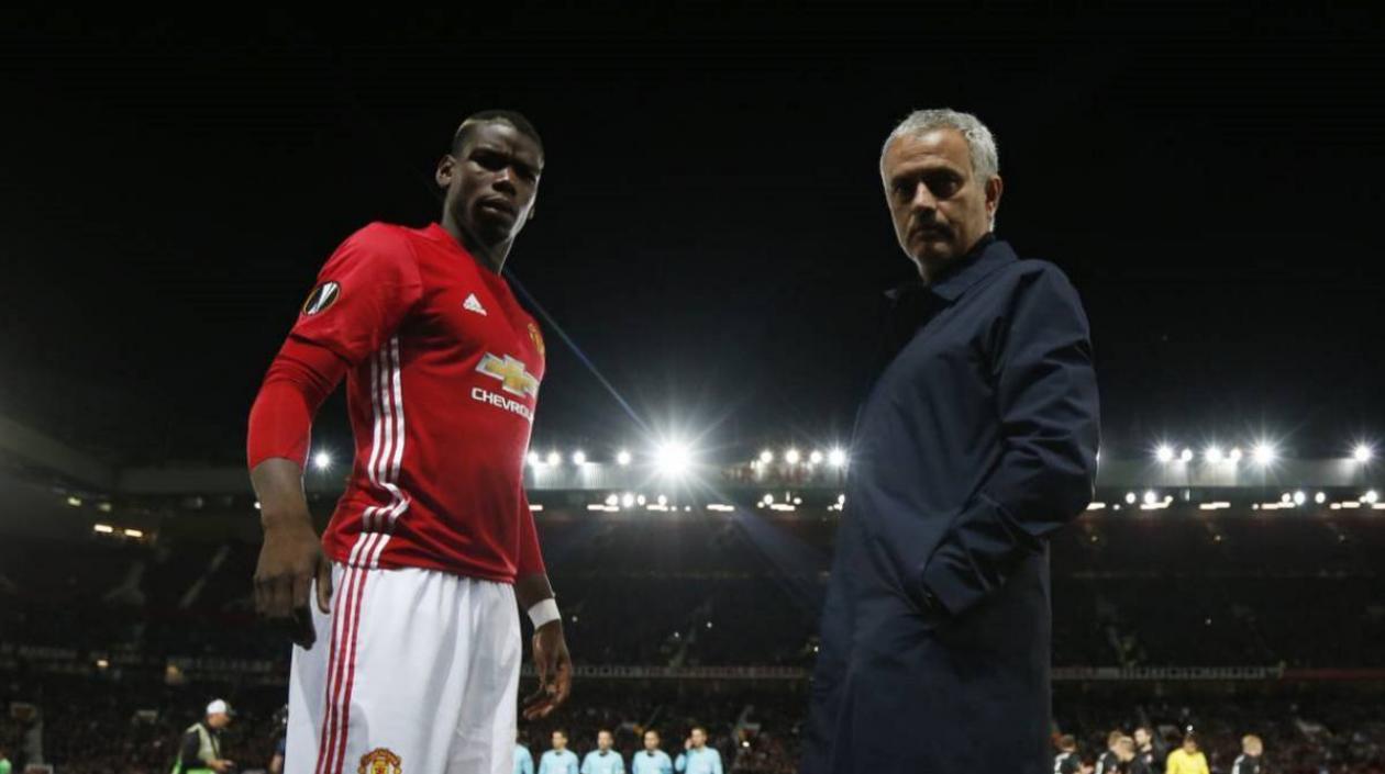 Paul Pogba y José Mourinho. 