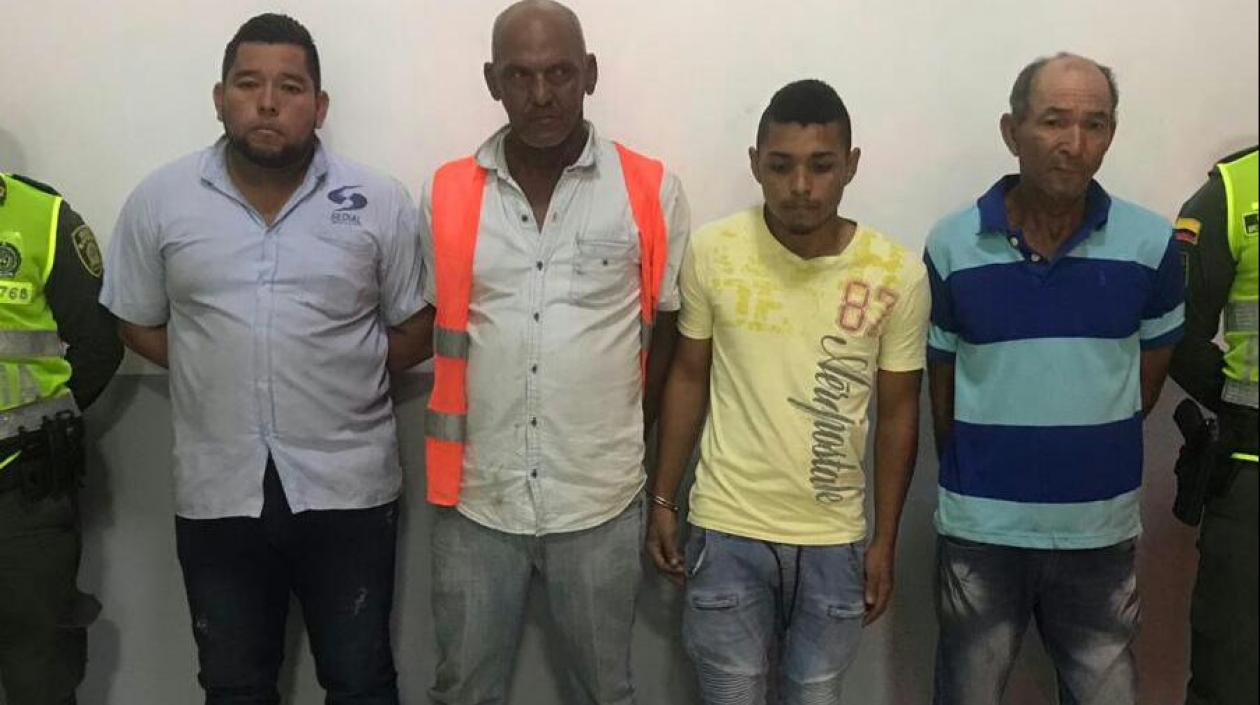 Los cuatro capturados.