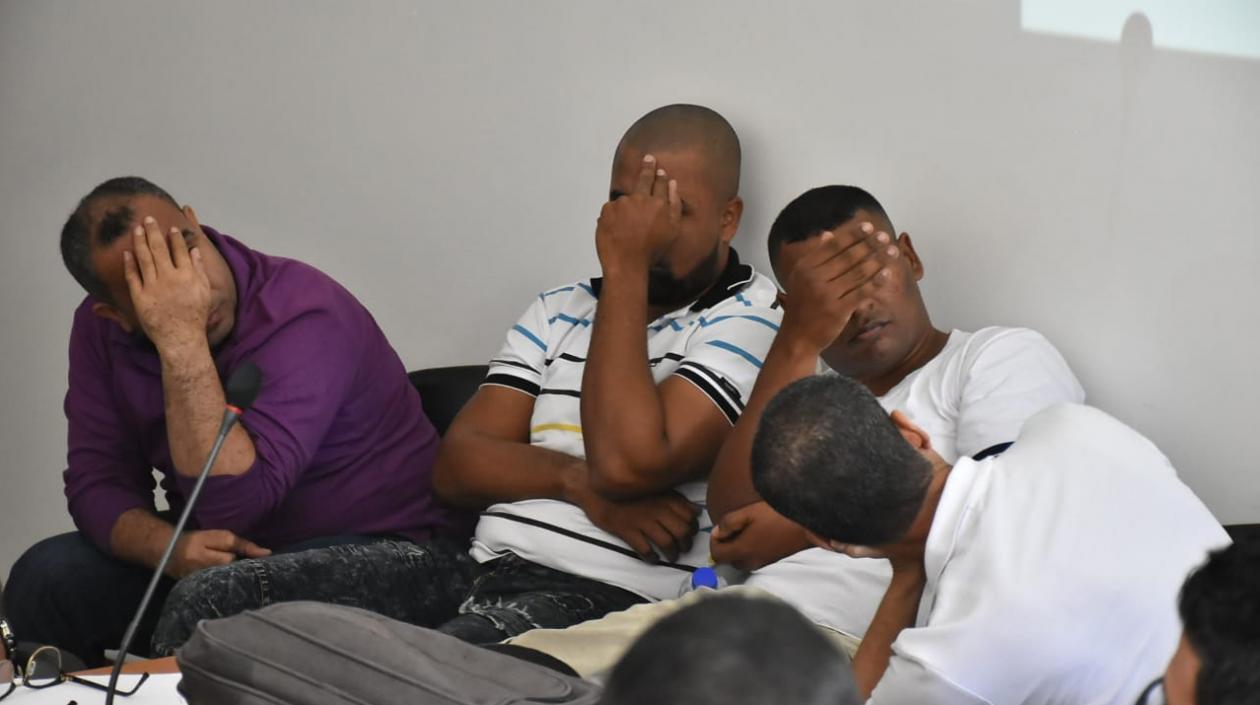 Los cuatro capturados.