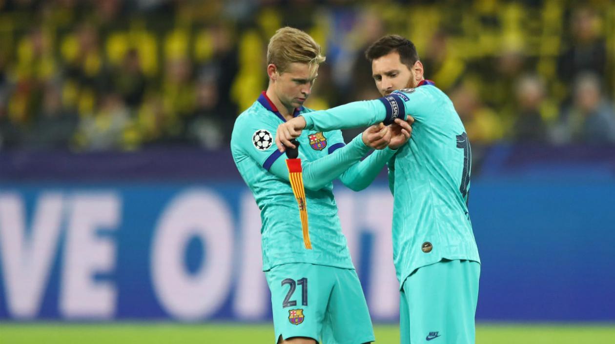 Frenkie De Jong y Lionel Messi. 