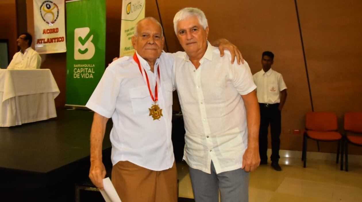 El fotógrafo Pedro Anchila y Julio Comesaña.