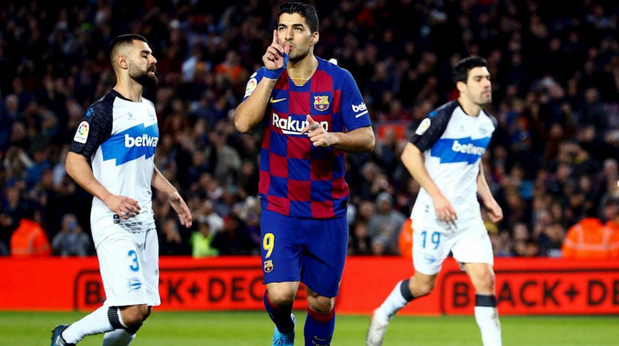 Luis Suárez celebra un gol con el Barcelona. 