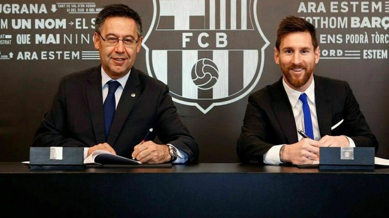 Josep Maria Bartomeu y Lionel Messi.