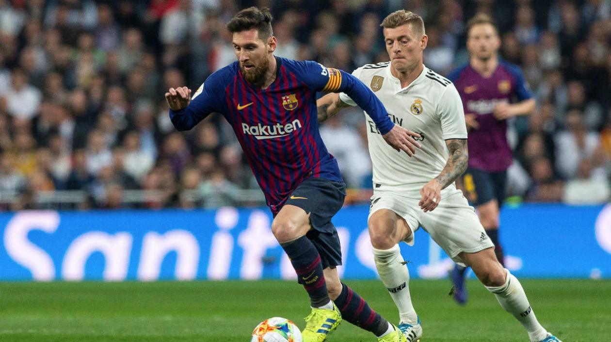 Lionel Messi y Toni Kroos. 