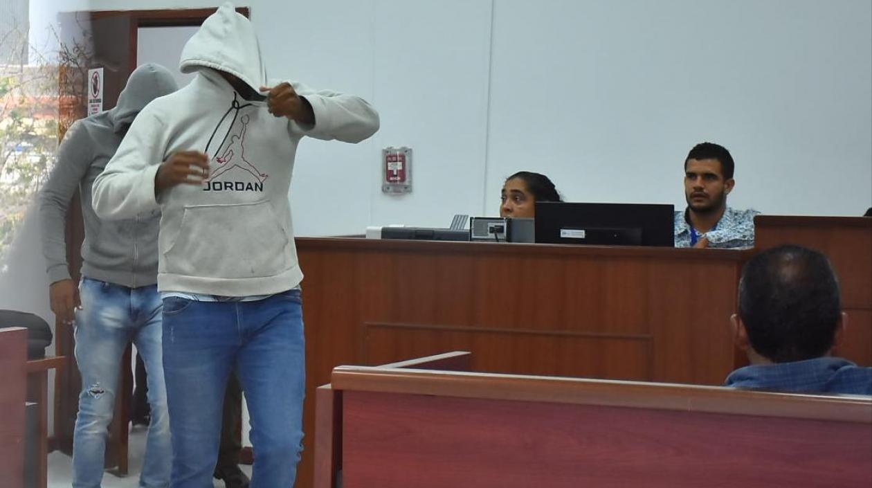 Los policías Luis Miguel Canedo y Andreis Rafael Juliao