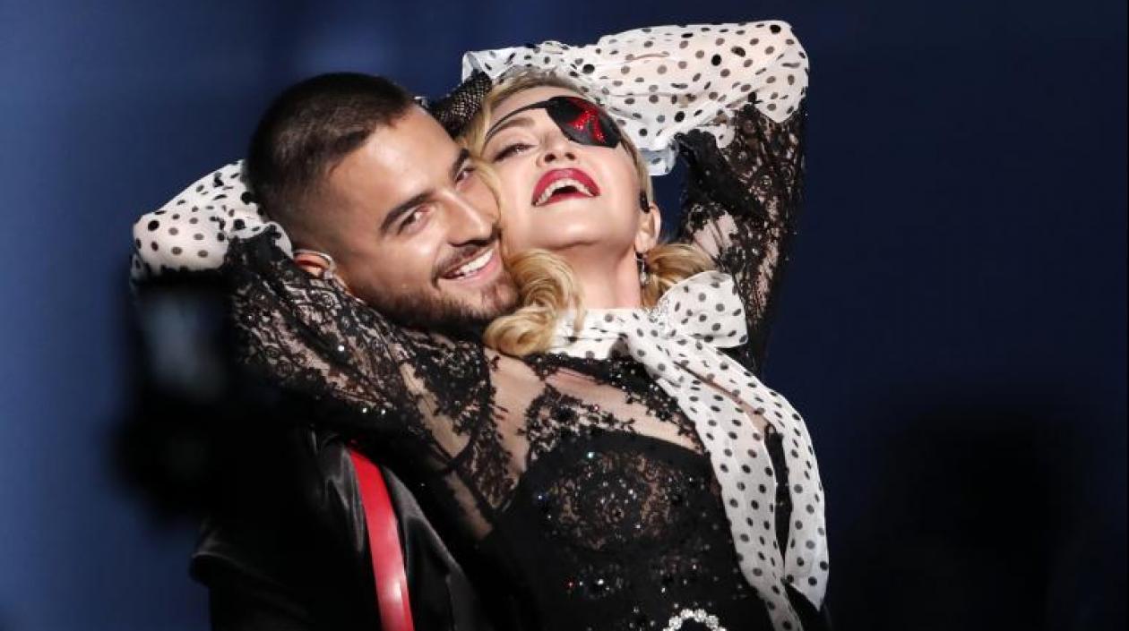 Los cantantes Maluma y Madonna.