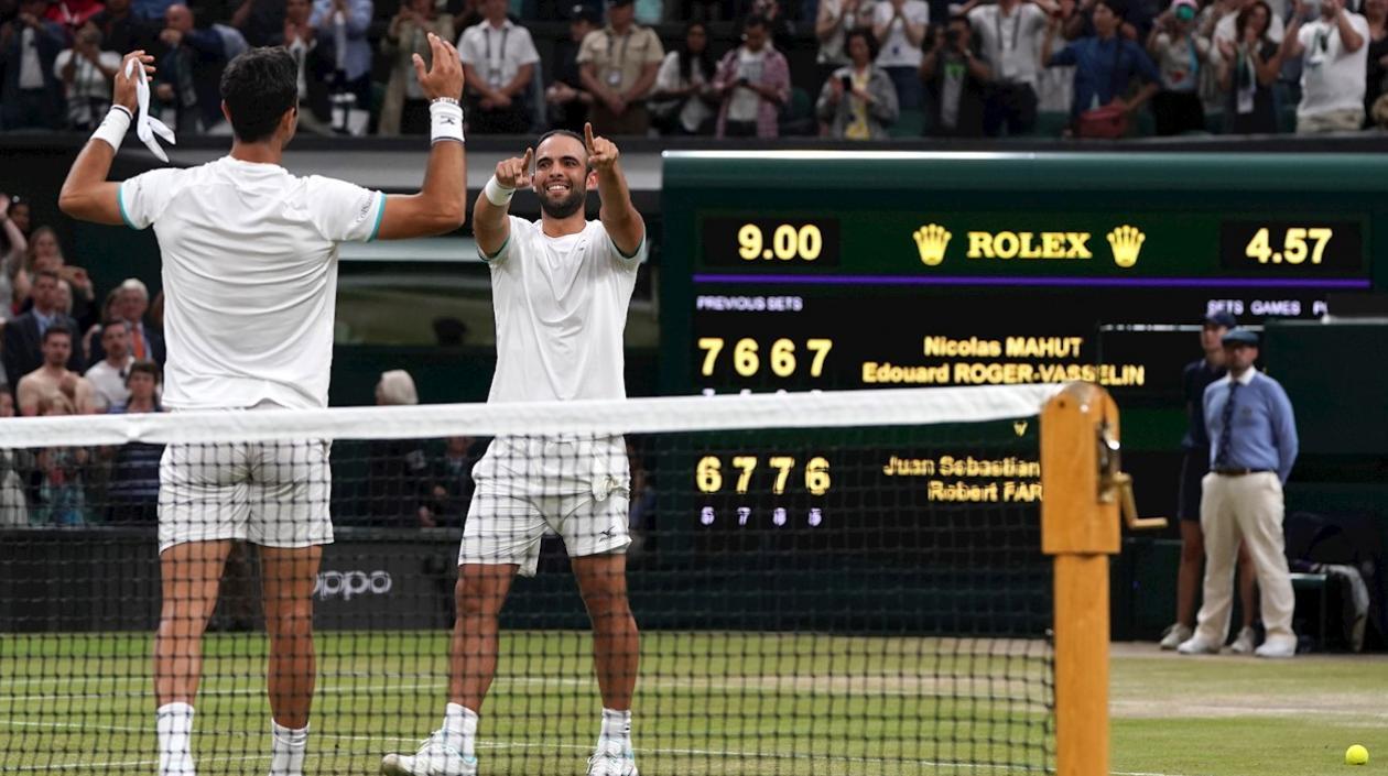 Juan Sebastián Cabal y Robetr Farah celebran tras el título. 