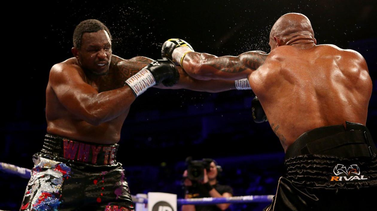 Momentos del combate entre Óscar Rivas y Dillion Whyte. 