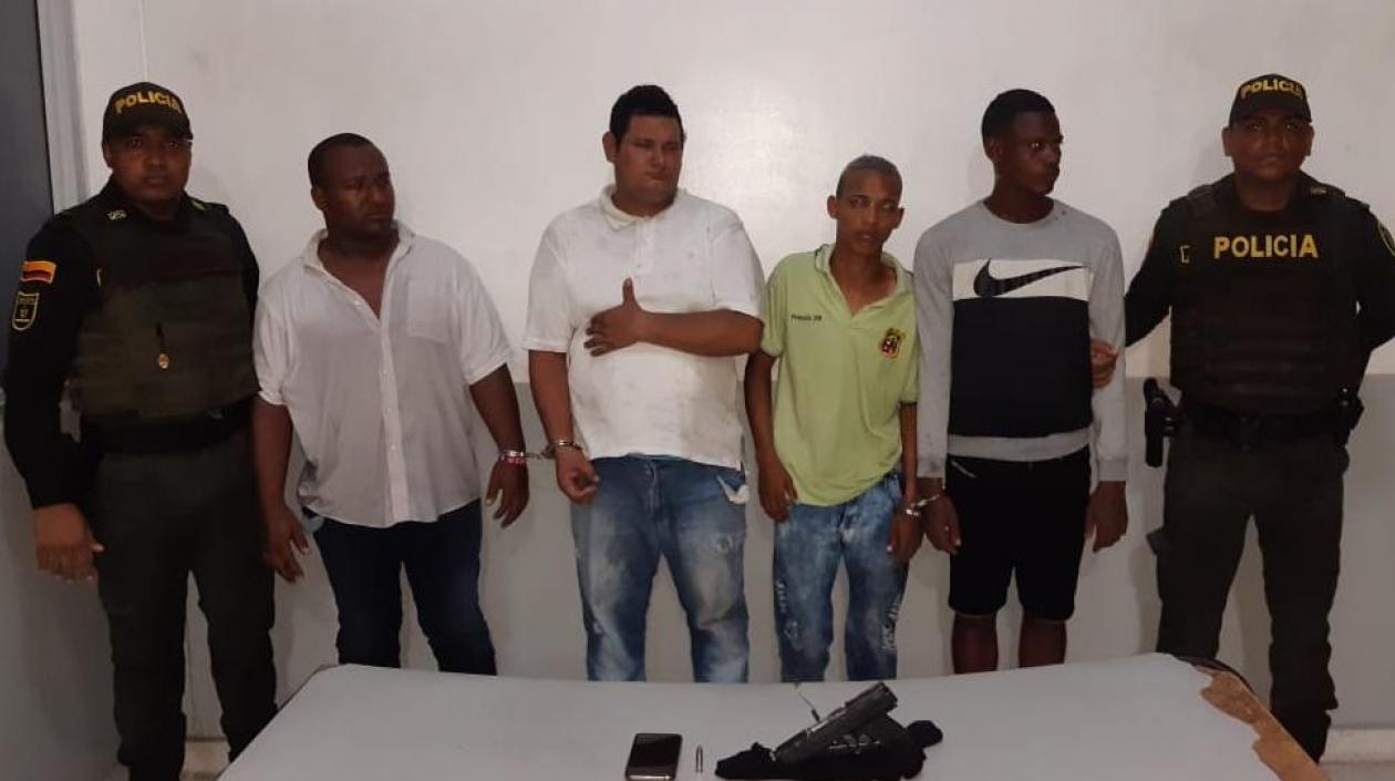 Los cuatro capturados por la Policía.