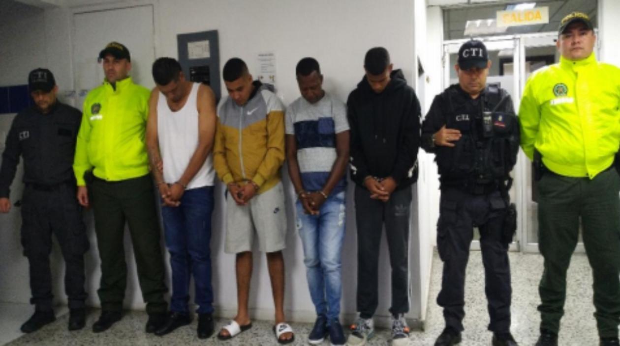 Los cuatro capturados.