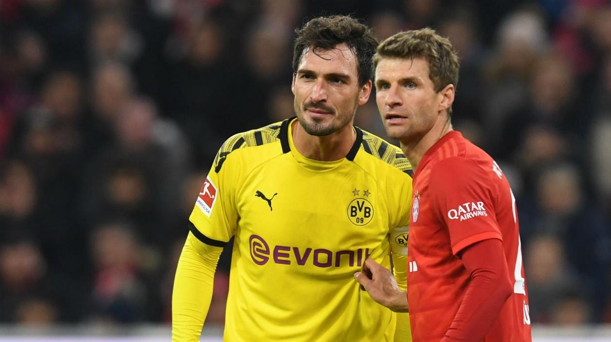 Mats Hummels y Thomas Müller.