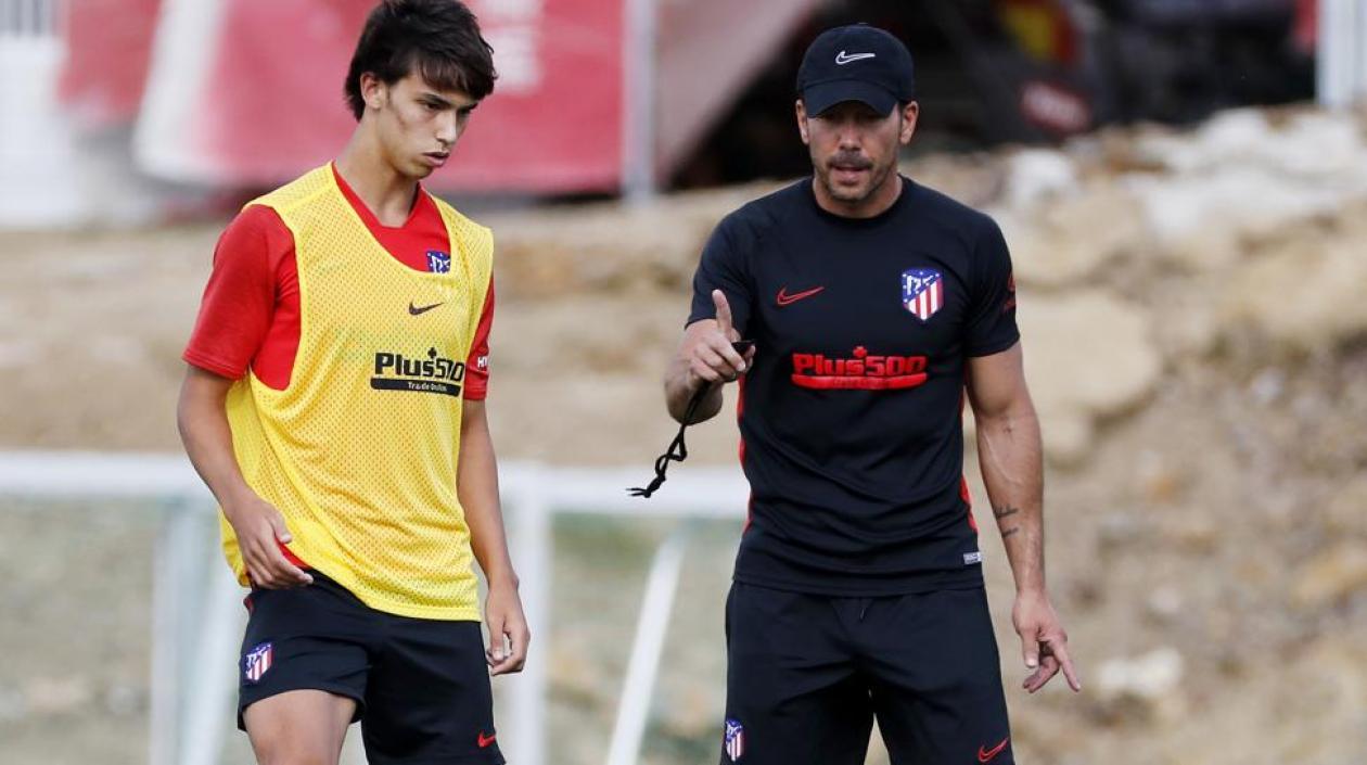 Joao Félix y Diego Simeone.