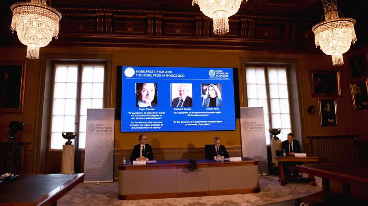 Roger Penrose, Reinhard Genzel y Andrea Ghez 