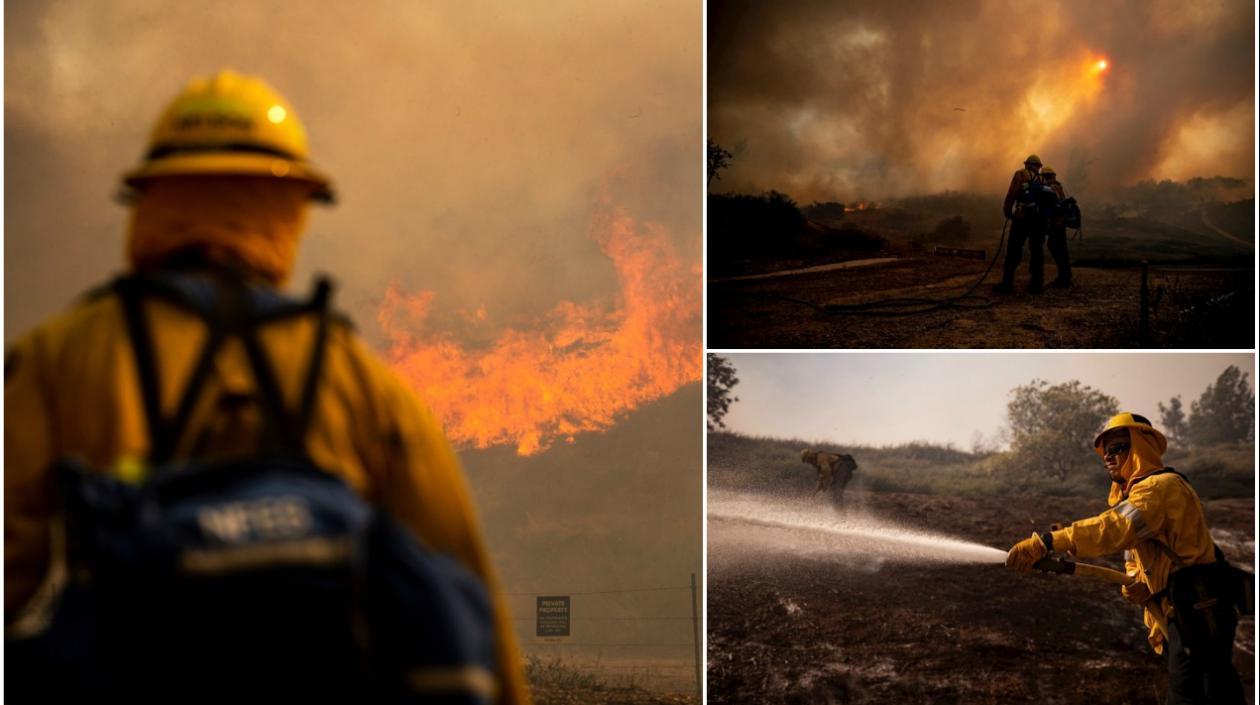 Bomberos tratan de controlar el fuego en Los Ángeles.