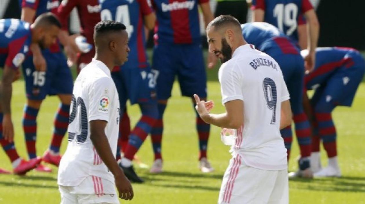 El brasileño Vinicius y Benzema.