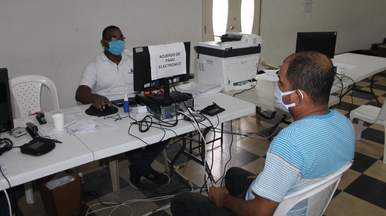 Puesto presencial para pagar multas.