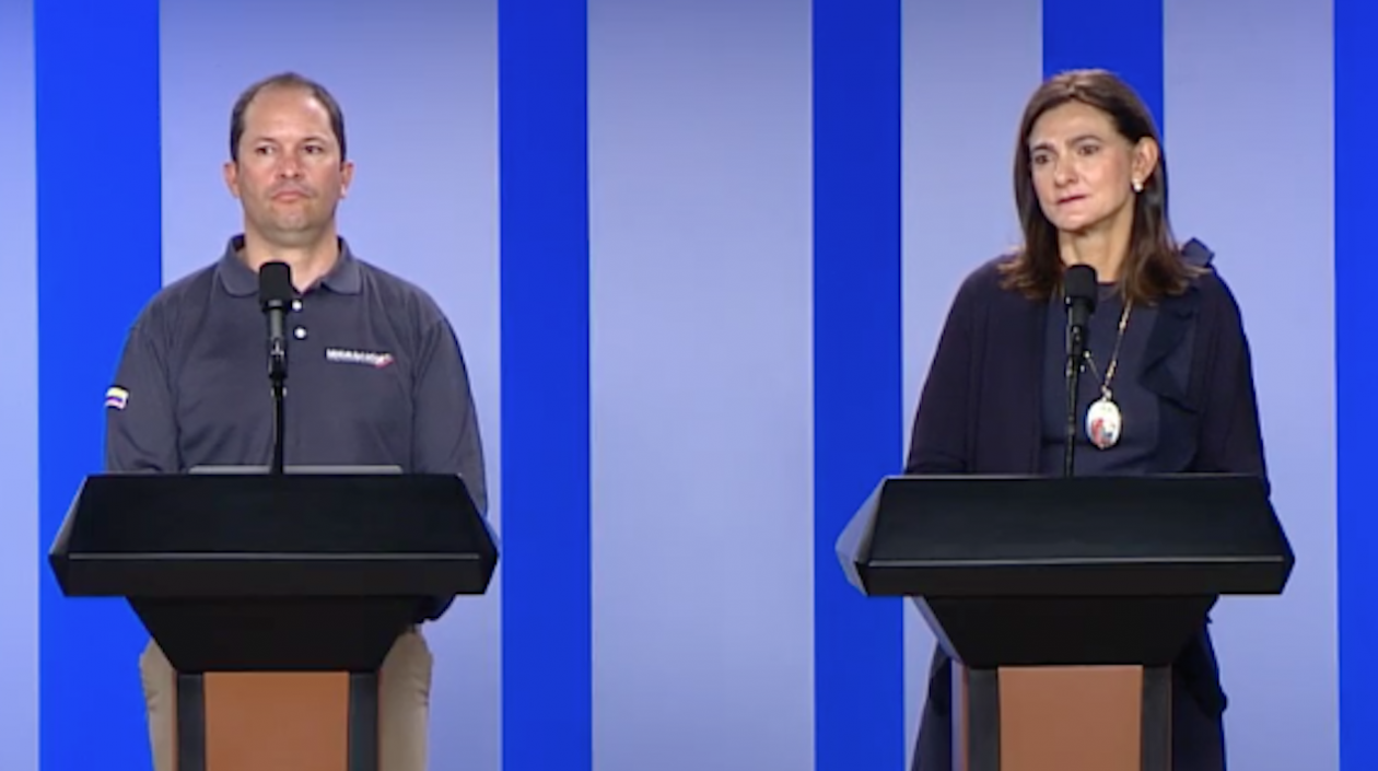 Director de Migración y Ministra de Transporte.